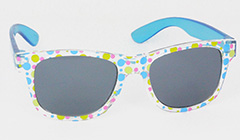 Transparante zonnebril voor kinderen met stippen.