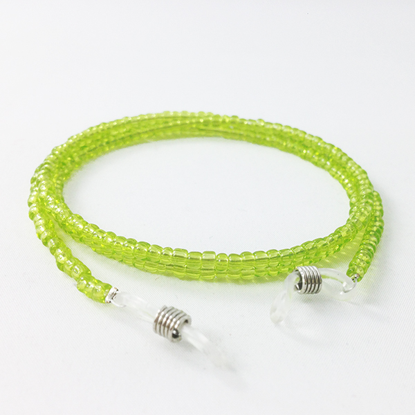 Brillenkoord met parels in lime groen.